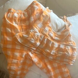 Orange and White Checkered anthropology lounge set.